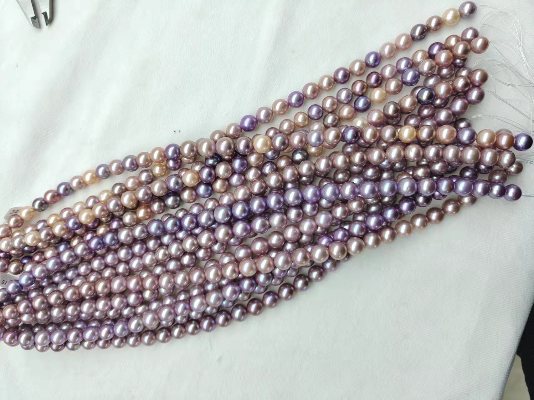 10-13.5 mm Pure pearls near round loose purple pearls wholesale freshwater pearl in strand