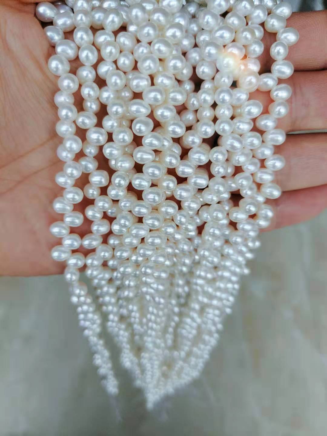 5-6 mm AAA rice pearl side hole Raw Pearls nature pearl loose Pearl suppliers and wholesale freshwater pearl with farm direct prices