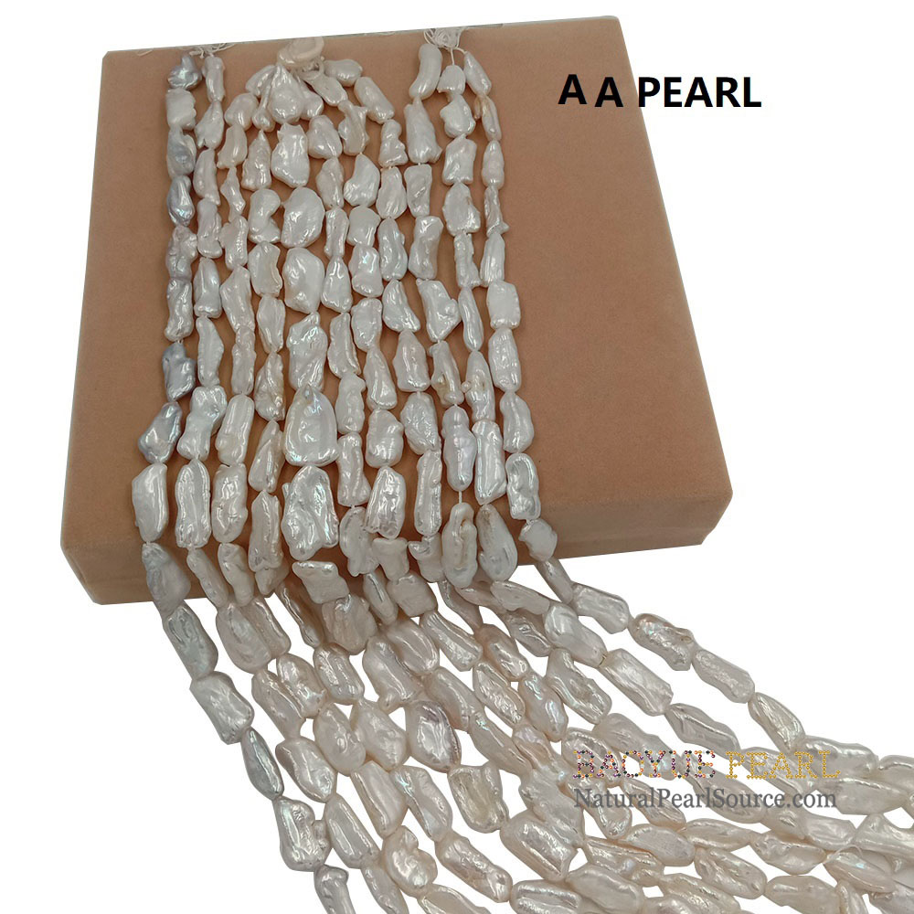 Freshwater pearls wholesale 10x23 mm big biwa baroque shape loose freshwater pearl in strand .