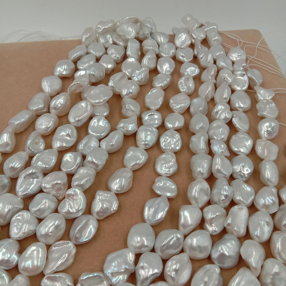 9-11 mm baroque freshwater pearl in strand 16 inch top high quality no flaw nature stone, nature white color . 