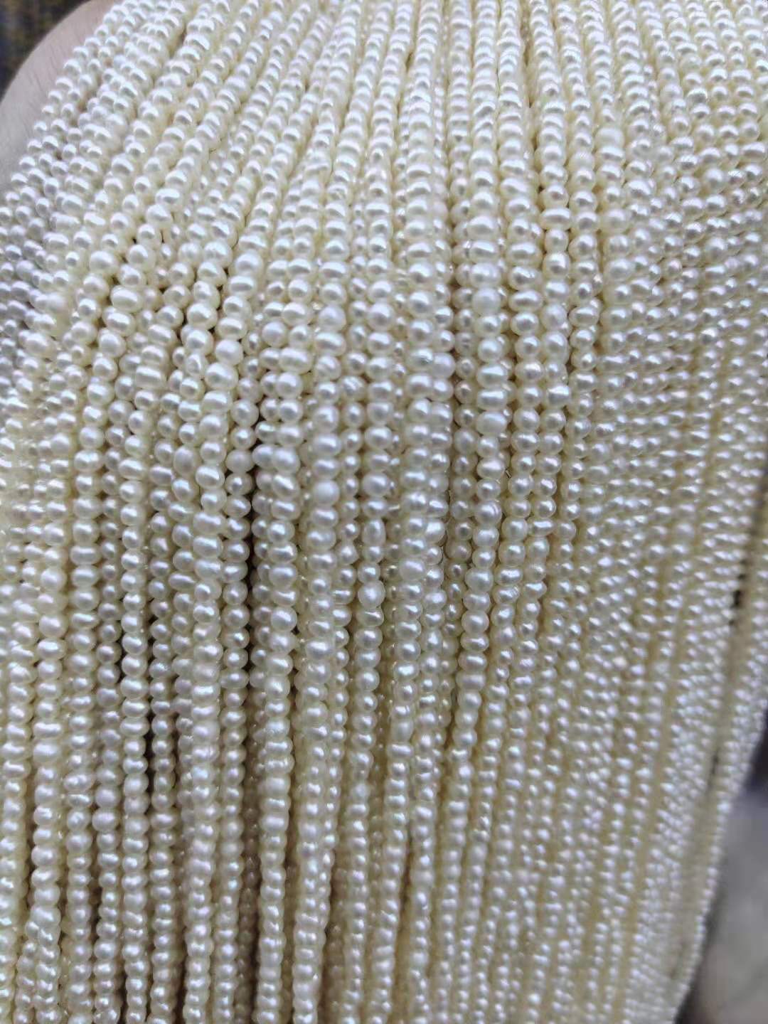 2.5-3 mm mini loose pearl wholesale freshwater pearl in strand, near round A mini freshwater pearl. 