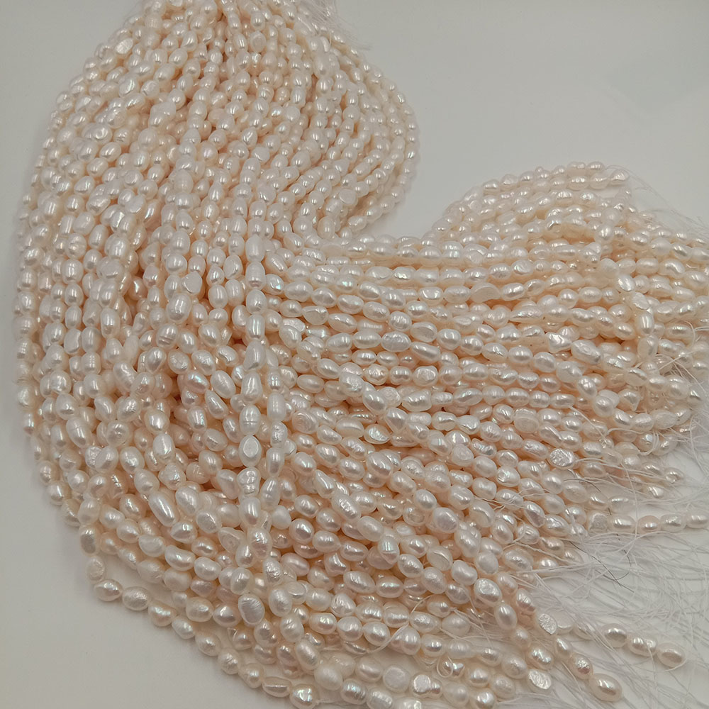 100% nature freshwater pearl in strand , width 6.3-7.3 mm long baroque pearl , available in white