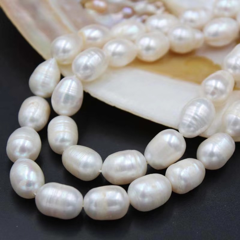 10-11mm Freshwater Pearl Strand White Rice Shape Cultured Loose Rice Pearl wholesale